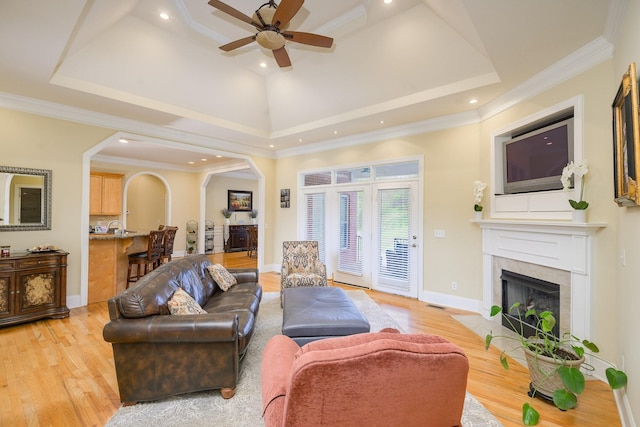 1416 Station Four Ln, Old Hickory, TN 37138 - living room featuring a tray ceiling, crown molding, and light hardwood / wood-style flooring