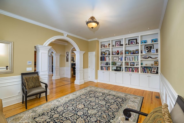 1416 Station Four Ln, Old Hickory, TN 37138 - sitting room featuring ornamental molding, built in features, wood-type flooring, and decorative columns
