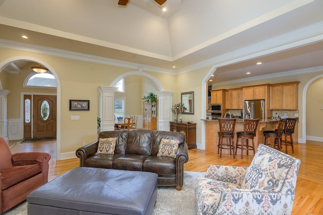 1416 Station Four Ln, Old Hickory, TN 37138 - living room with decorative columns, ornamental molding, ceiling fan, and light hardwood / wood-style flooring