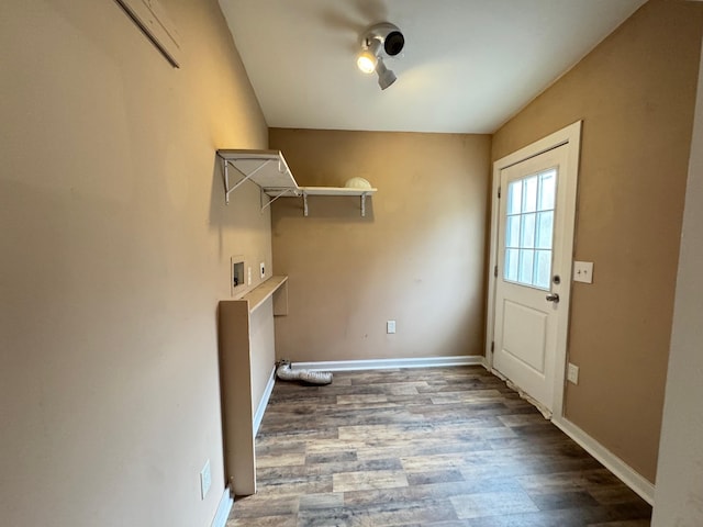 laundry room featuring hookup for a washing machine and dark hardwood / wood-style floors