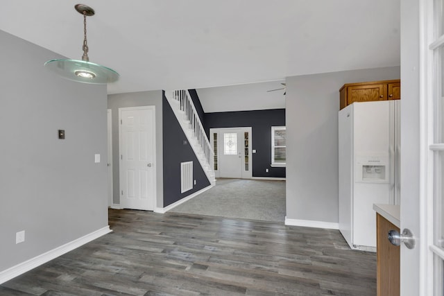 interior space with dark hardwood / wood-style flooring