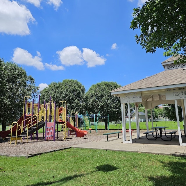 view of playground featuring a yard and a gazebo