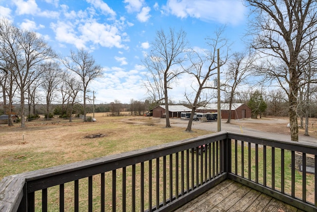 deck featuring a lawn