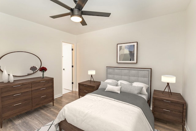 bedroom with baseboards, a ceiling fan, and wood finished floors