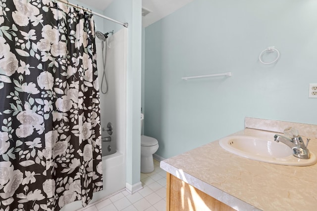 full bathroom with vanity, tile patterned floors, toilet, and shower / bath combo with shower curtain