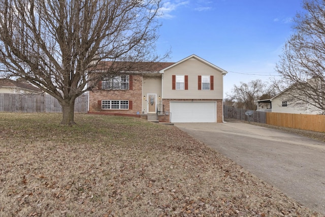 raised ranch featuring a garage