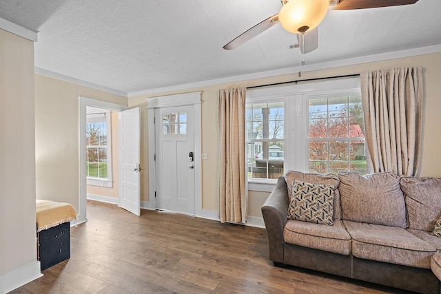 entrance foyer with dark wood-type flooring and ceiling fan