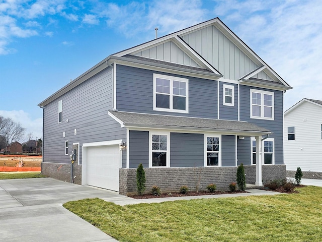 craftsman-style home with a garage and a front yard