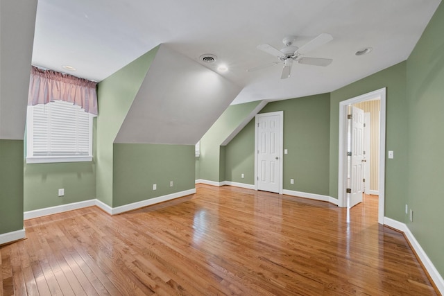 bonus room featuring ceiling fan, lofted ceiling, and light hardwood / wood-style floors