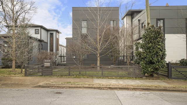 view of property's community featuring a fenced front yard