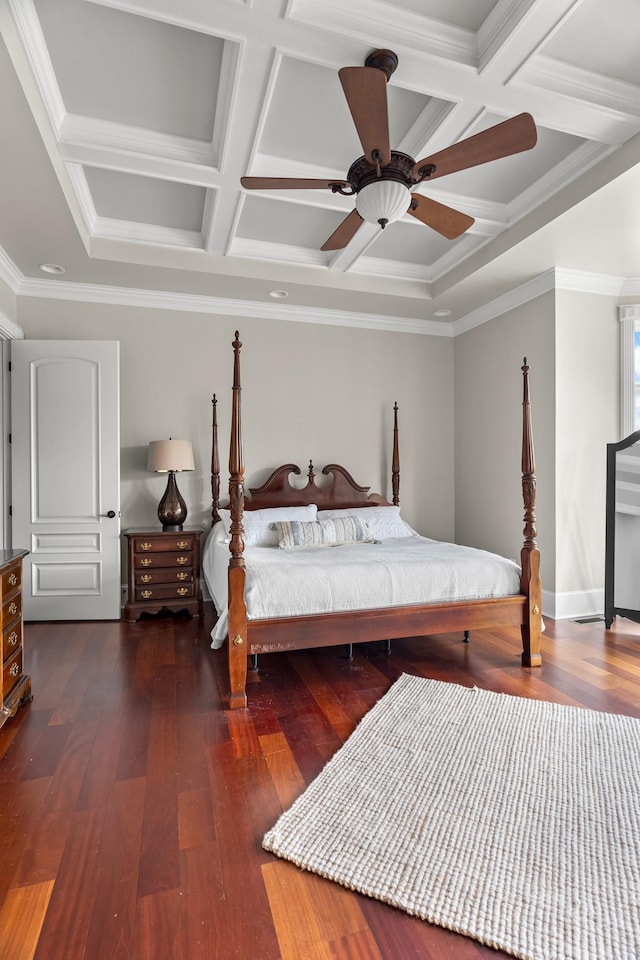 bedroom featuring coffered ceiling, crown molding, and dark hardwood / wood-style floors