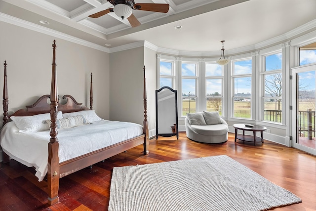 bedroom featuring crown molding, access to exterior, hardwood / wood-style flooring, and coffered ceiling