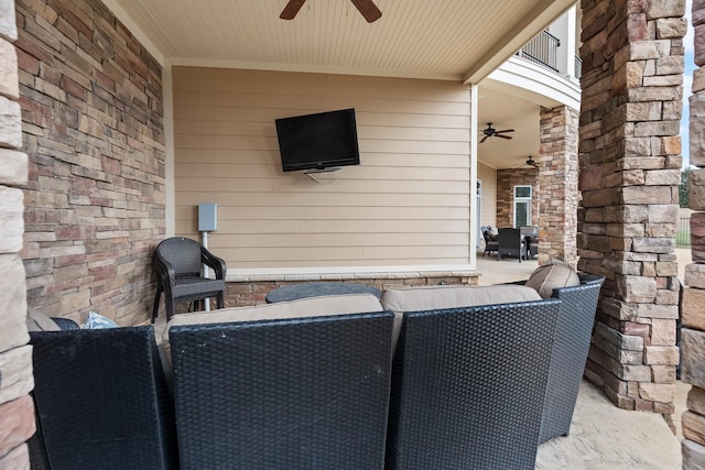 view of patio / terrace featuring ceiling fan and outdoor lounge area