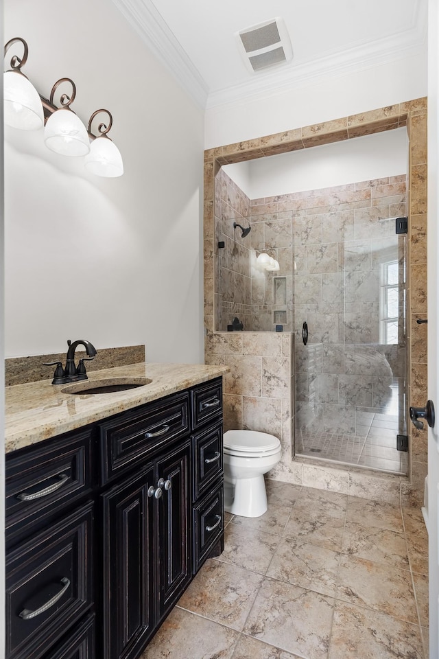 bathroom featuring crown molding, toilet, vanity, and walk in shower