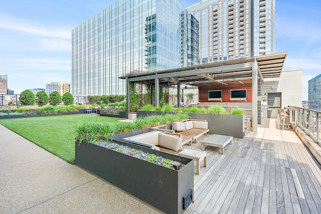 exterior space featuring an outdoor living space and a lawn