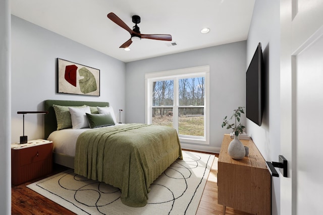 bedroom with recessed lighting, visible vents, ceiling fan, and light wood-style flooring