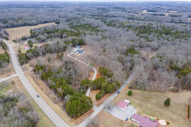 bird's eye view with a forest view