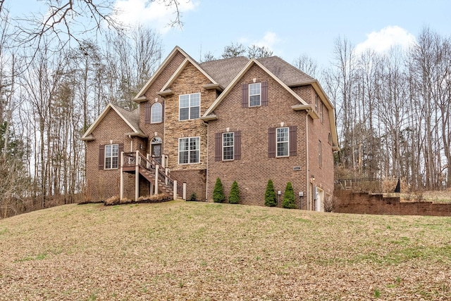 view of front of house with a front lawn