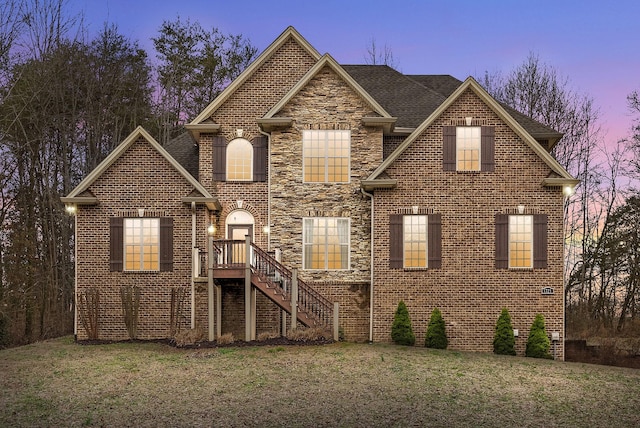 view of front property with a yard