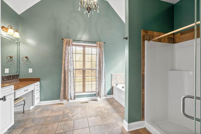 bathroom with tile patterned flooring, an inviting chandelier, high vaulted ceiling, vanity, and separate shower and tub