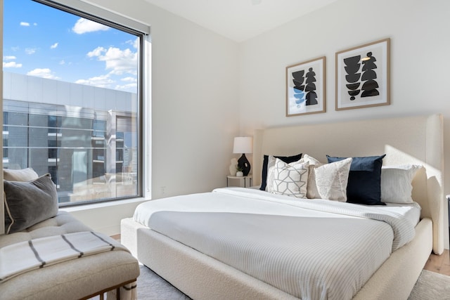 bedroom with light hardwood / wood-style floors