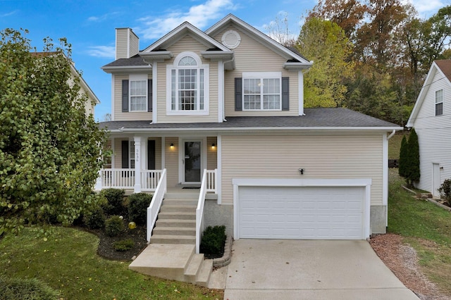 front facade featuring a porch and a garage