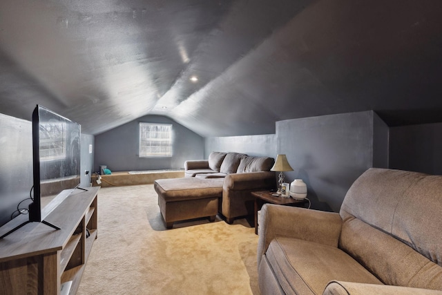 home theater with vaulted ceiling and carpet floors