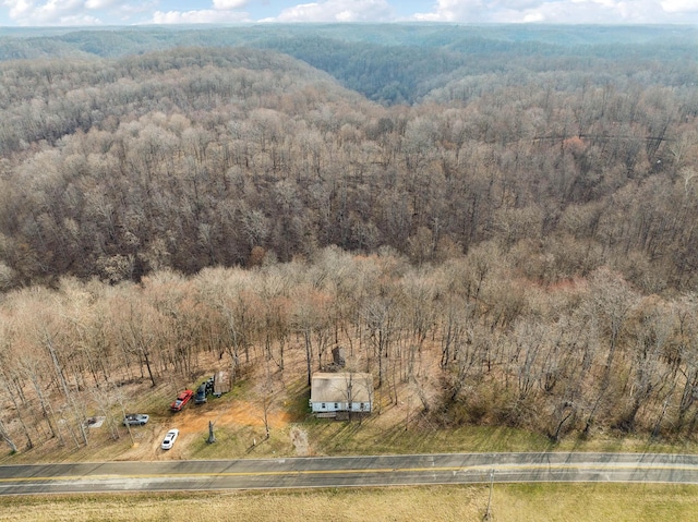 bird's eye view featuring a rural view and a view of trees