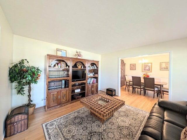 living room with light hardwood / wood-style flooring