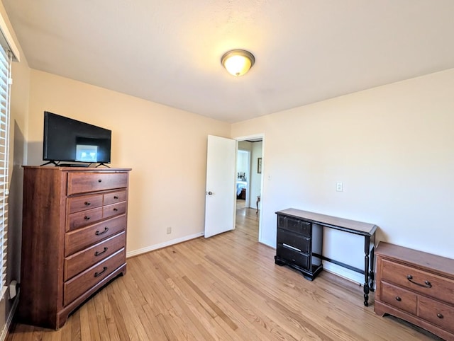 bedroom with light hardwood / wood-style flooring