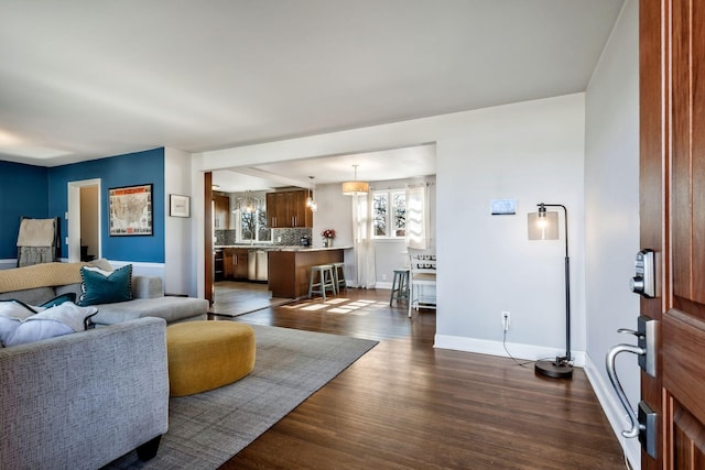 living room with dark hardwood / wood-style floors