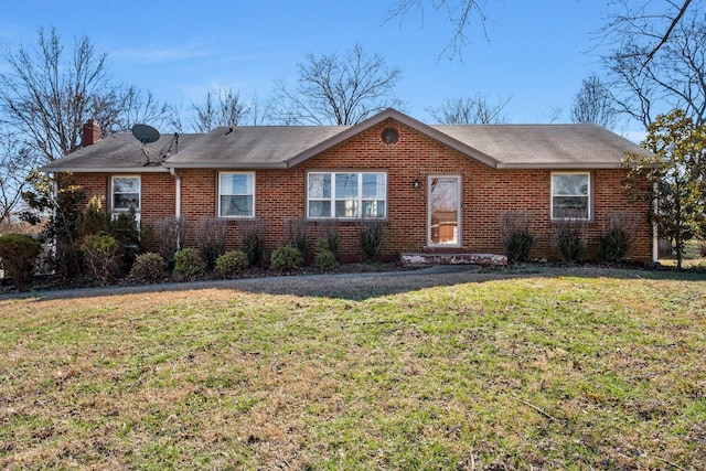 single story home with a front yard