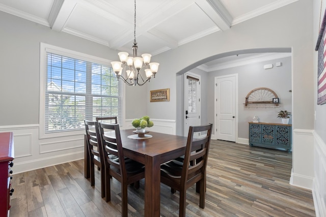 dining room with beam ceiling, dark wood-type flooring, crown molding, and coffered ceiling