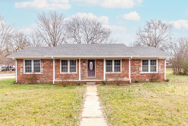 ranch-style house with a porch and a front lawn