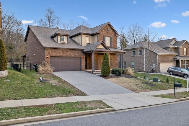 view of front of property with a front lawn and a garage