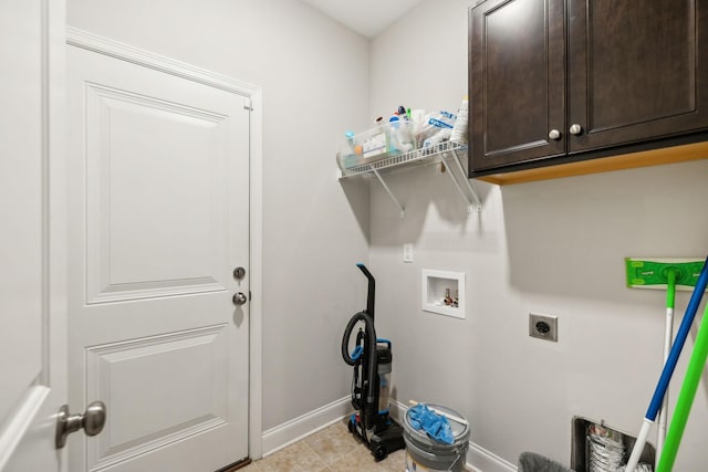 laundry room featuring cabinets, washer hookup, and electric dryer hookup