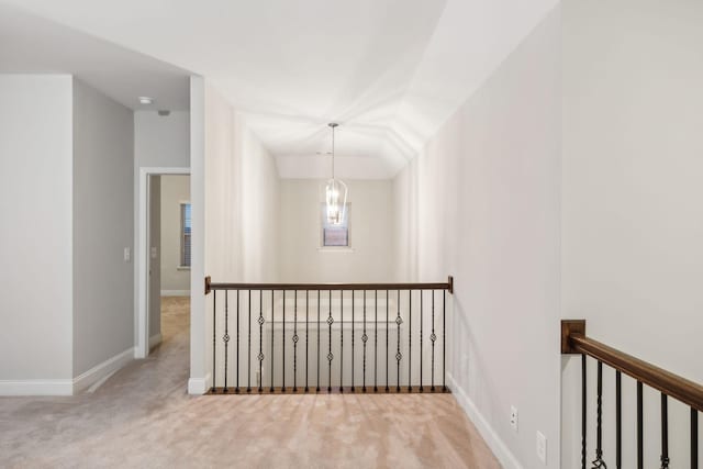 hallway with light carpet