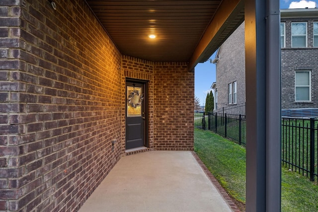 doorway to property featuring a patio area