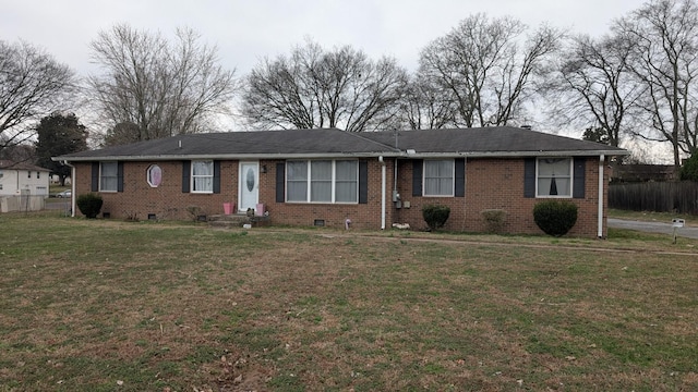 ranch-style home with a front lawn