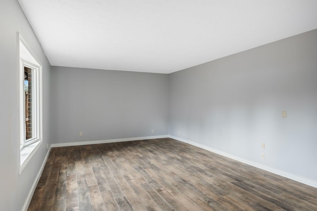 214 Cedarwood Ln Unit 214, Madison, TN 37115 - spare room with dark wood-type flooring and baseboards