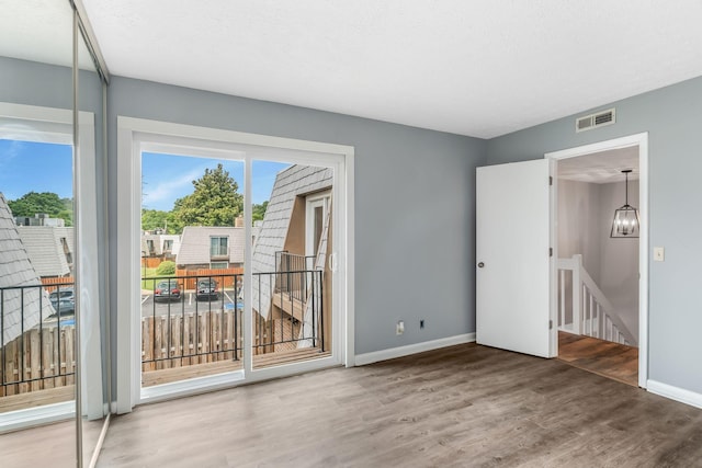 214 Cedarwood Ln Unit 214, Madison, TN 37115 - unfurnished room featuring wood finished floors and baseboards