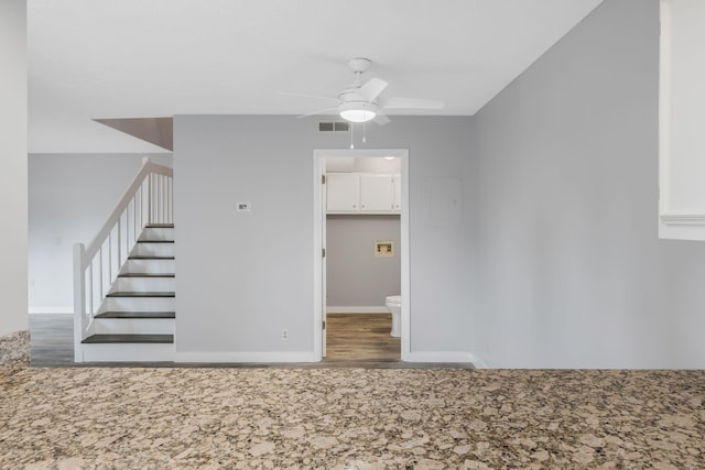 214 Cedarwood Ln Unit 214, Madison, TN 37115 - empty room with wood finished floors, ceiling fan, and stairs
