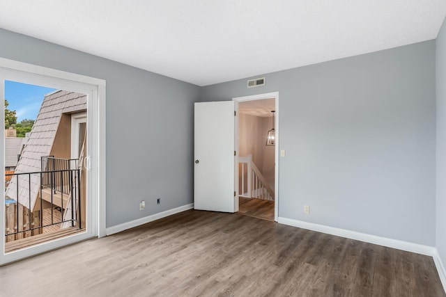 214 Cedarwood Ln Unit 214, Madison, TN 37115 - spare room with wood finished floors and baseboards
