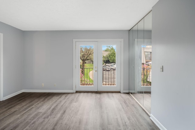 214 Cedarwood Ln Unit 214, Madison, TN 37115 - spare room featuring wood finished floors and french doors