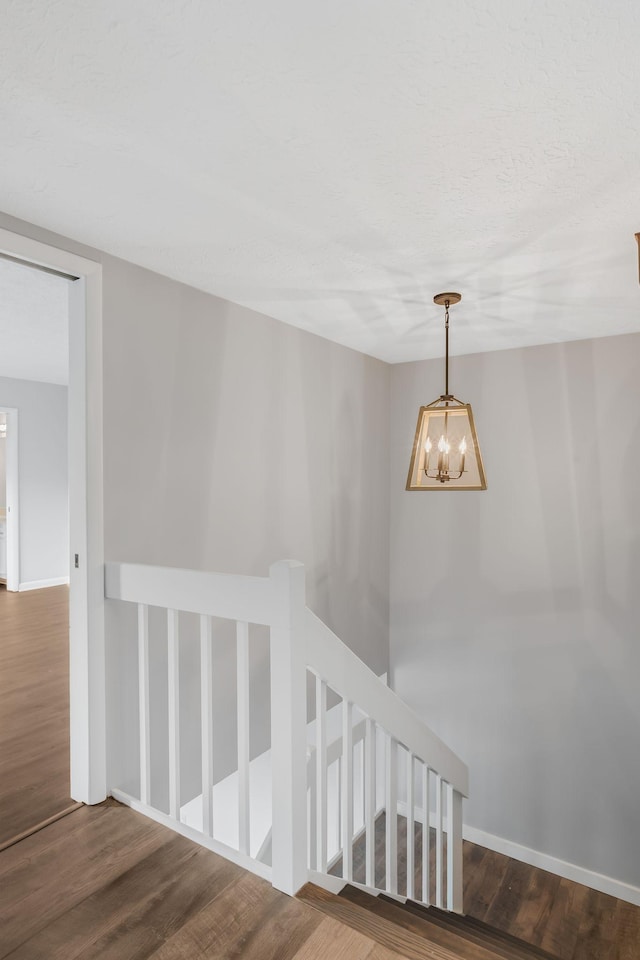214 Cedarwood Ln Unit 214, Madison, TN 37115 - stairway with wood finished floors and a chandelier