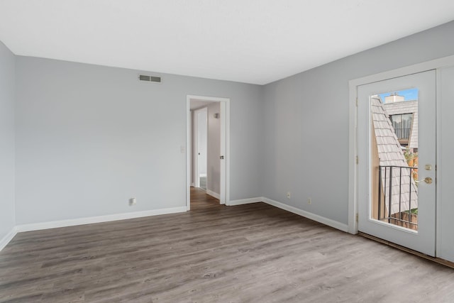 214 Cedarwood Ln Unit 214, Madison, TN 37115 - spare room with wood finished floors and baseboards