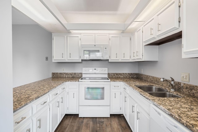 214 Cedarwood Ln Unit 214, Madison, TN 37115 - kitchen featuring white appliances, white cabinets, and dark wood-type flooring