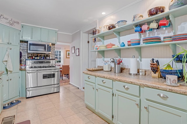 2360 Seven Mile Ferry Rd, Clarksville, TN 37040 - kitchen with ornamental molding, stainless steel appliances, and light tile patterned floors
