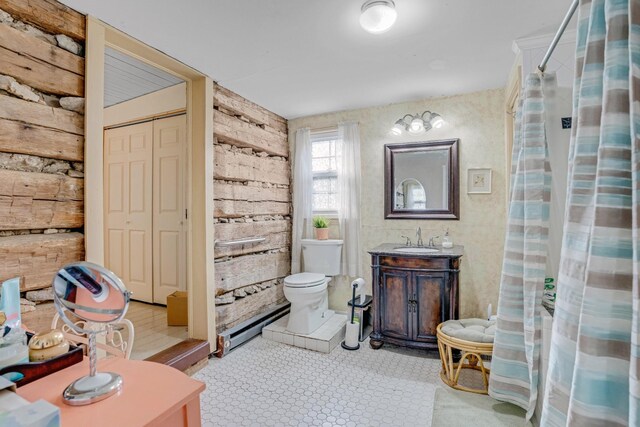 2360 Seven Mile Ferry Rd, Clarksville, TN 37040 - bathroom with walk in shower, a baseboard radiator, vanity, and toilet