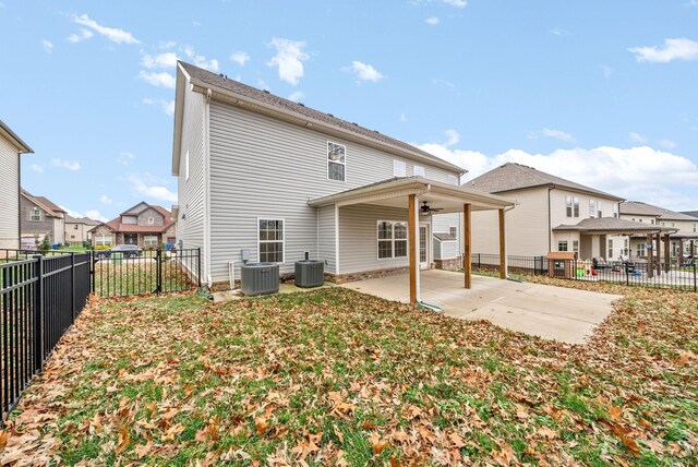 back of property with a patio, ceiling fan, and central air condition unit